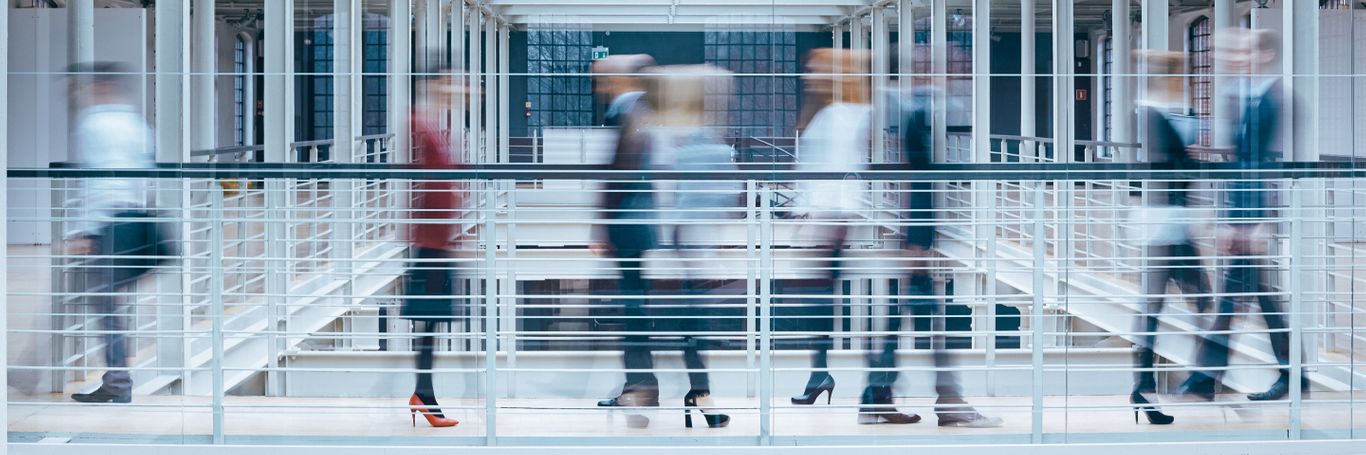 Employees walking in office